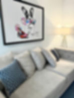 Interior photo of Severance Therapy’s office featuring a comfortable couch, creating a warm and inviting space for in-person