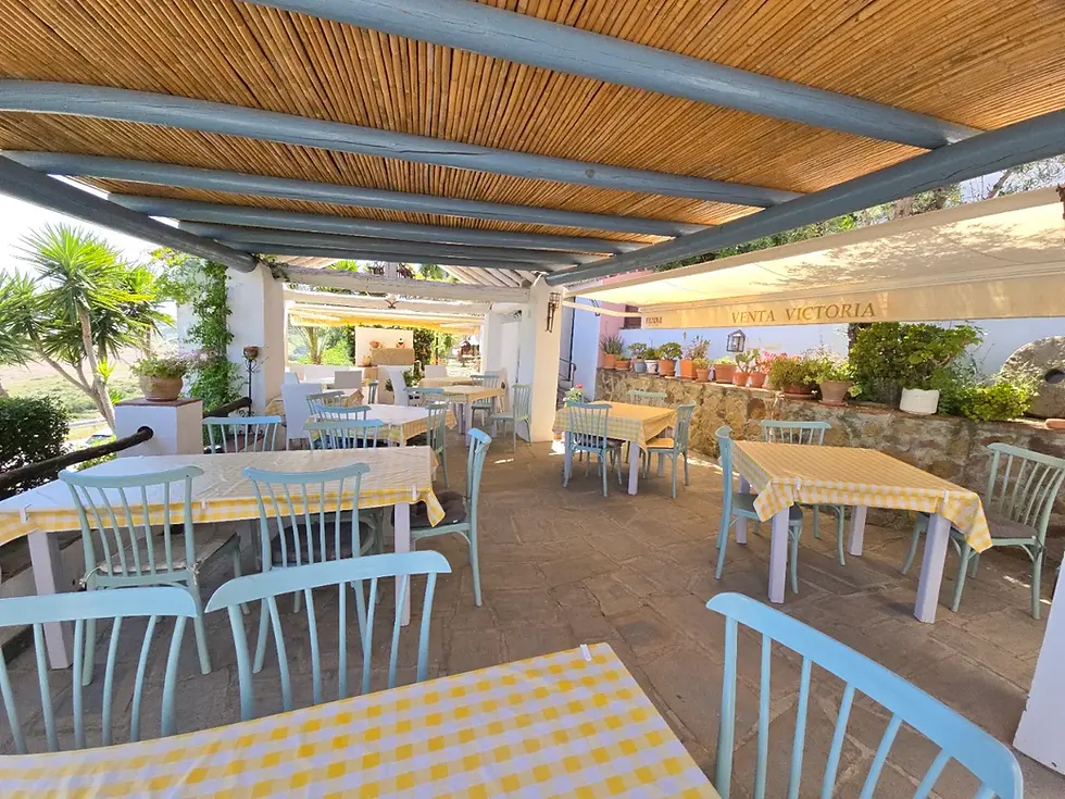Outdoor terrace at Venta Victoria restaurant near Casares