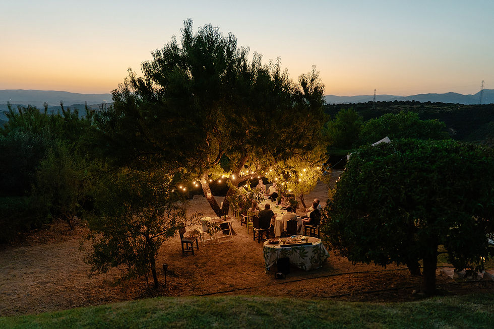 Outdoor dining at sunset at La Fuente de Casares
