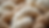 Close-up view of natural wool yarn skeins in soft earth tones