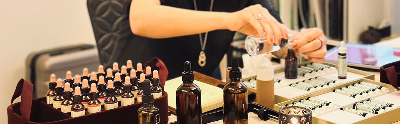 Potion Artisan Pauline Wong is mixing potion at an event