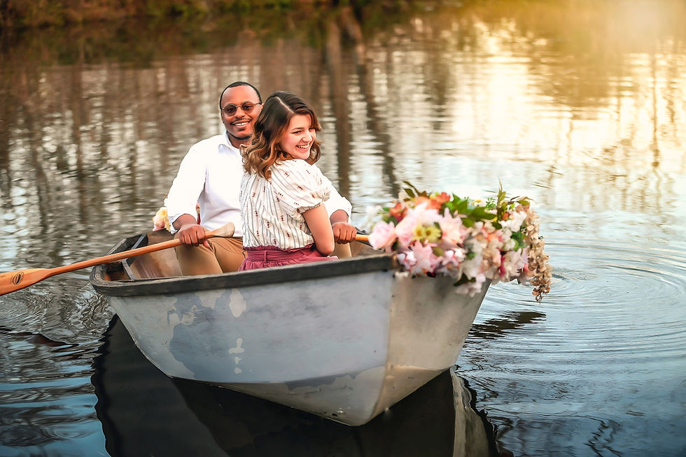 Engagement Couple in a Rowboat with Flowers on a pond at the Little Ranch Farm in Santa Fe Texas