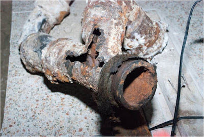 corroded cast iron pipe