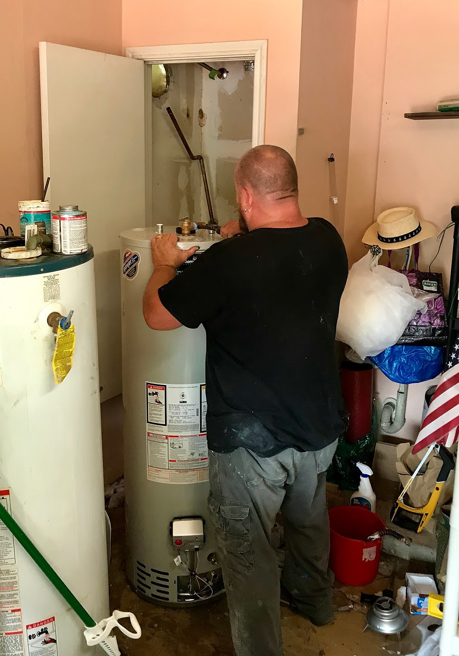 Mikey is working on replacing a water heater