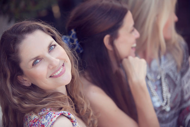 Female smiling w friends.jpg