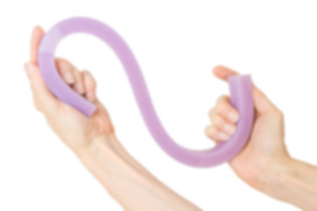 Hands holding a purple silicone noodle mold | Chicago Culinary FX