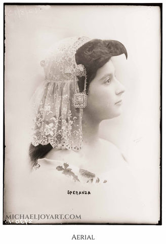 Sepia-toned portrait of a young woman, wearing a veil