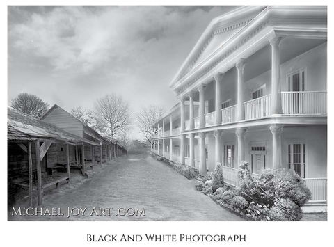 Black and white photograph: old west town street