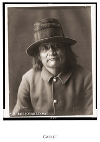 Black and white portrait photo of a Native American man named CABET wearing a hat