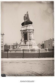 Monumental statue, early photography, city background