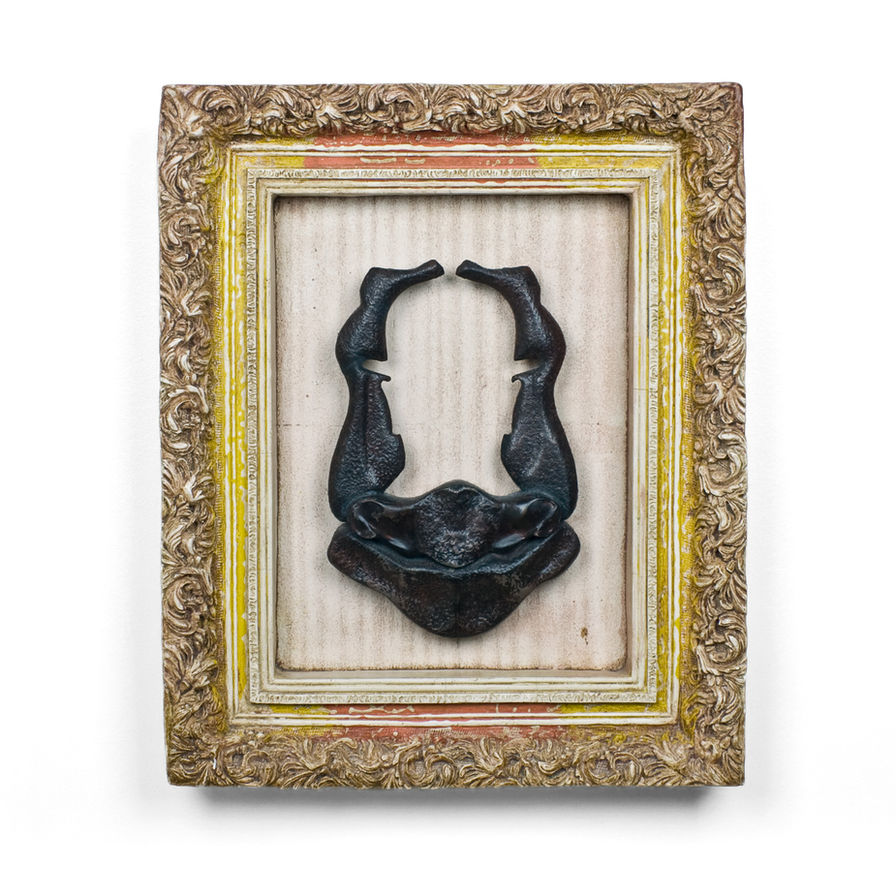 Framed artwork: dark necklace sculpture