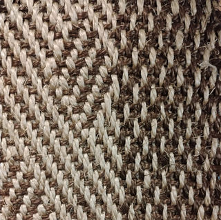 Tappeto in sisal spigato