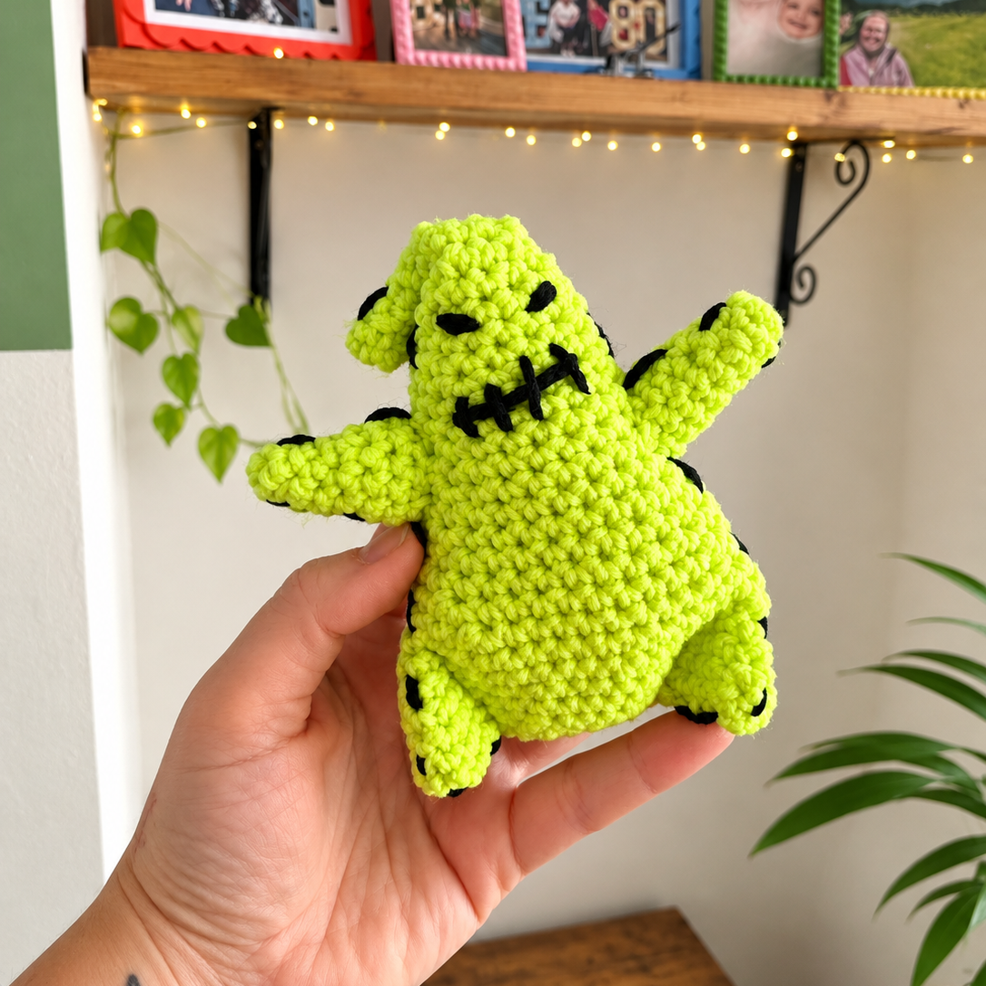Handmade Oogie Boogie crochet doll from The Nightmare Before Christmas, spooky Halloween amigurumi crochet pattern