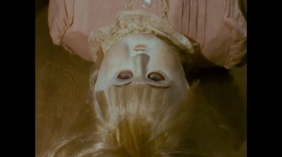 Alice wearing the skin of a doll