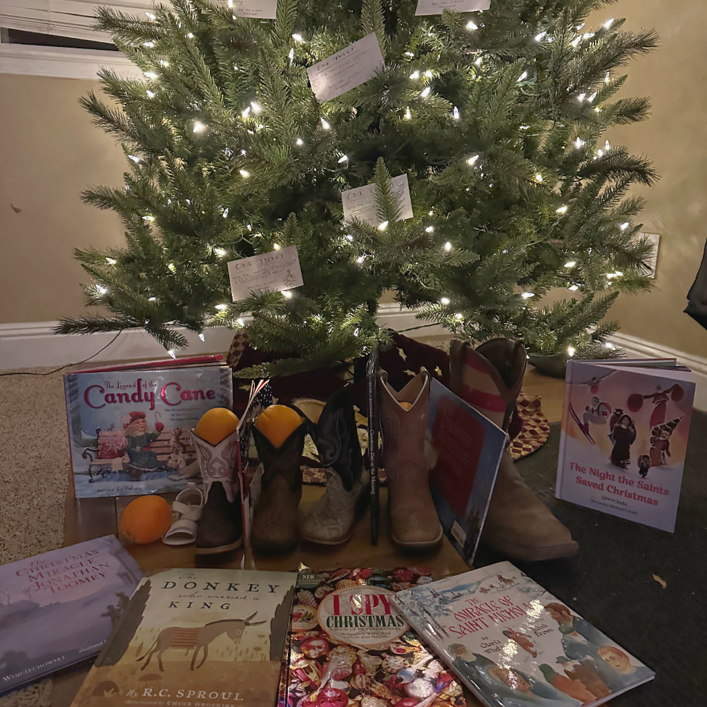 Christmas Tree with boots, books, and oranges for Saint Nicholas's Catholic feast day. 
