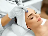 Woman having a HydraFacial treatment in Spa