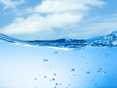 Water droplets appearing beneath the waves, representing internal clarity over external noise