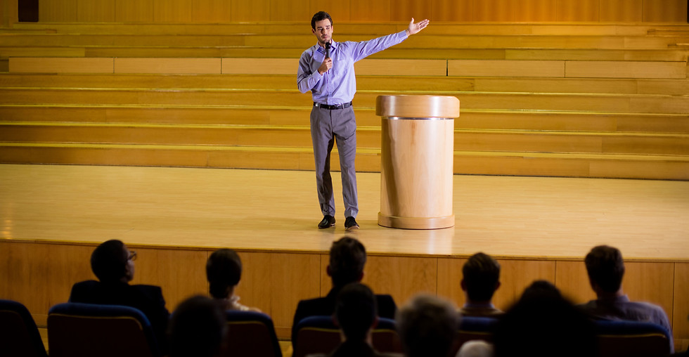 male-business-executive-giving-speech.jpg