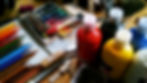 Assortment of art materials and tools