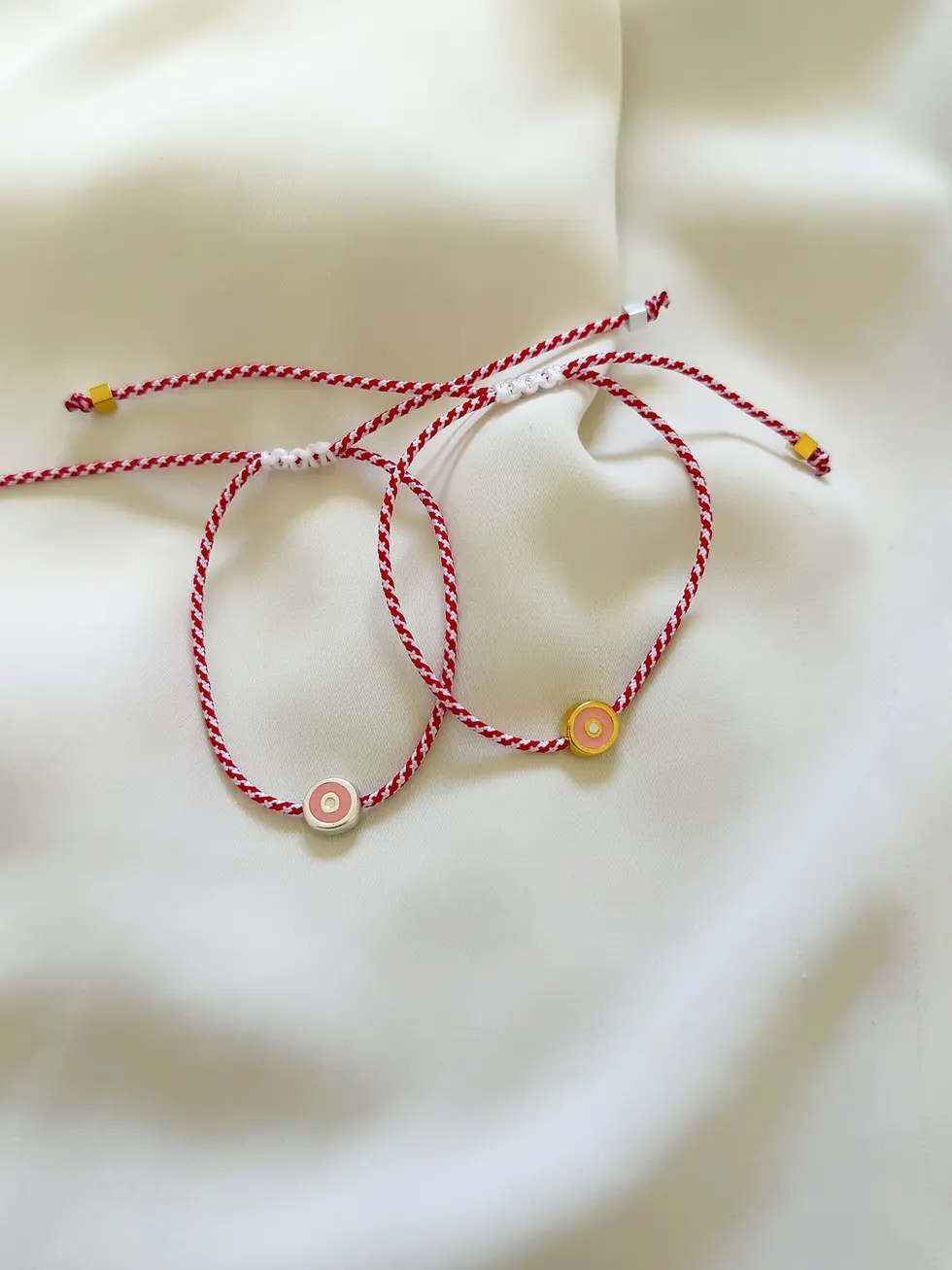 βραχιόλι μαρτης με ροζ ματι