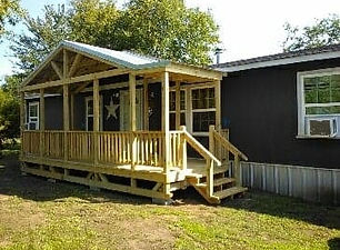 mobile home deck with 4' wide steps and rails