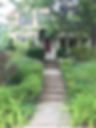 A rain garden in front of a house