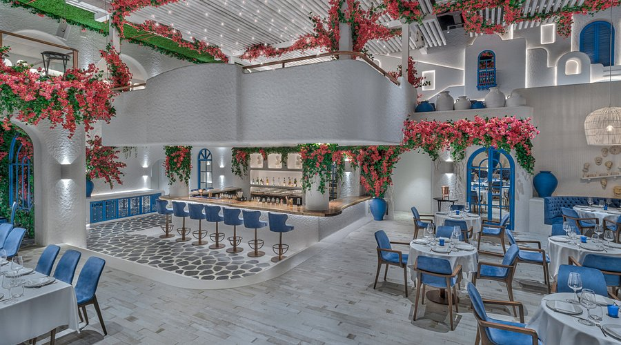 The space leans heavily toward Santorini-inspired decor: white-and-blue hues, warm lighting, and dramatic flourishes. This Mumbai restaurant spotlights interiors that "transport" visitors to Greece. Guests always speak about its high-energy music and party atmosphere. Opa Kipos is fine for celebrations, not so much for whispered tones. We recommend that you book early for evening times.