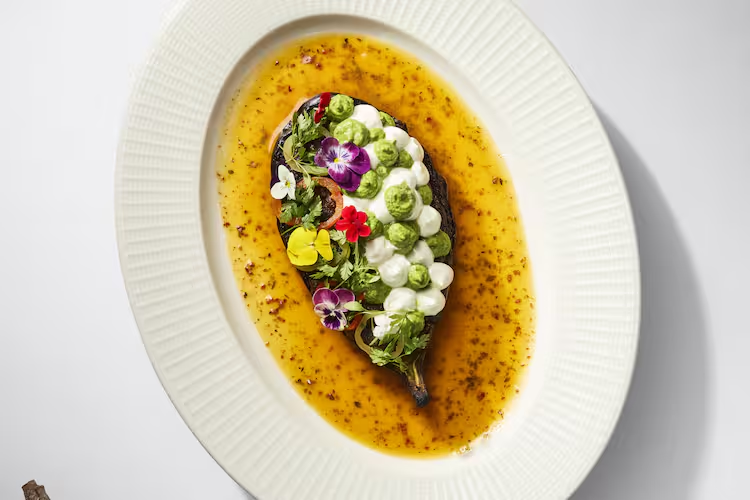 At Opa Kipos, you’ll dive into Greek comfort food done with flair. Start with the signature Opa Hummus served with warm pita, or try the flaky Greek Spinach Pie loaded with dill and feta. For mains, the Chicken Gyros, charcoal-grilled chicken wrapped in pita with tzatziki, is a fan-fave, as is the hearty Vegetable Moussaka layered with aubergine and cheese. Round off with the Baklava Sundae, a dessert filo cup filled to the brim with pistachio cream and yogurt ice cream.