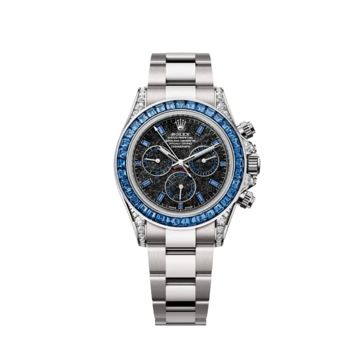 White Gold Blue Sapphire Daytona is a brilliant harmony of form and function. This piece happens to be one of the more visually striking Daytona models, housed within a 40mm white gold case and topped off with a blue sapphire dial.  Right in the center is the Caliber 4130 automatic movement, a model of precision and reliability. A chronograph complication with a tachymeter scale makes this a functional watch and even a great conversation starter. The bracelet is also fitted with a white gold Oysterlock clasp to keep the watch securely on the wrist. This model screams exclusivity and sophistication as it is a bold new take on the standard chronograph.