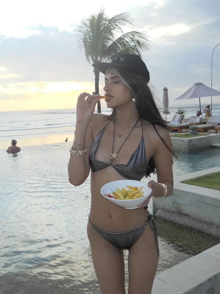 The primary objective of the Comet Cascade bikini is to have fun. Walking on the beach or lounging by your pool, this two-piece offers movement and a lively sense of drama along with the drifting ruffle trim on the top and bottom.