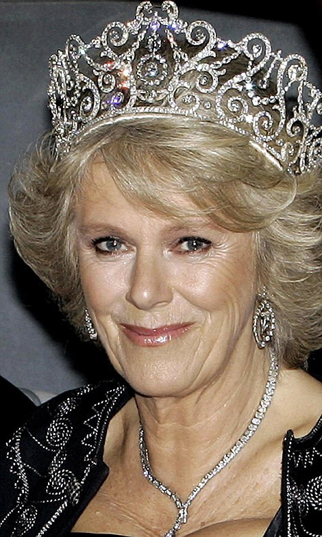 Commissioned by Queen Mary in 1911 from Garrard for the Delhi Durbar, the grand coronation celebrations in India, this delicate yet regal tiara features a central emerald drop surrounded by intricate diamond work. It was designed to be worn with matching emerald or diamond jewellery from the Delhi Durbar parure. Queen Mary wore it in 1911, and Queen Camilla has revived it for modern state banquets. It represents the height of British imperial splendour and the royal family’s connection to India.