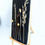Thumbnail: Droogbloemen op hout. Afm. 37x19x3 cm.