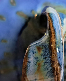 Midnight Rain and Sapphire is a striking, ceramic tea set made using stoneware clay and three glazes including flux which enhances the movement, tones and visual textures. 