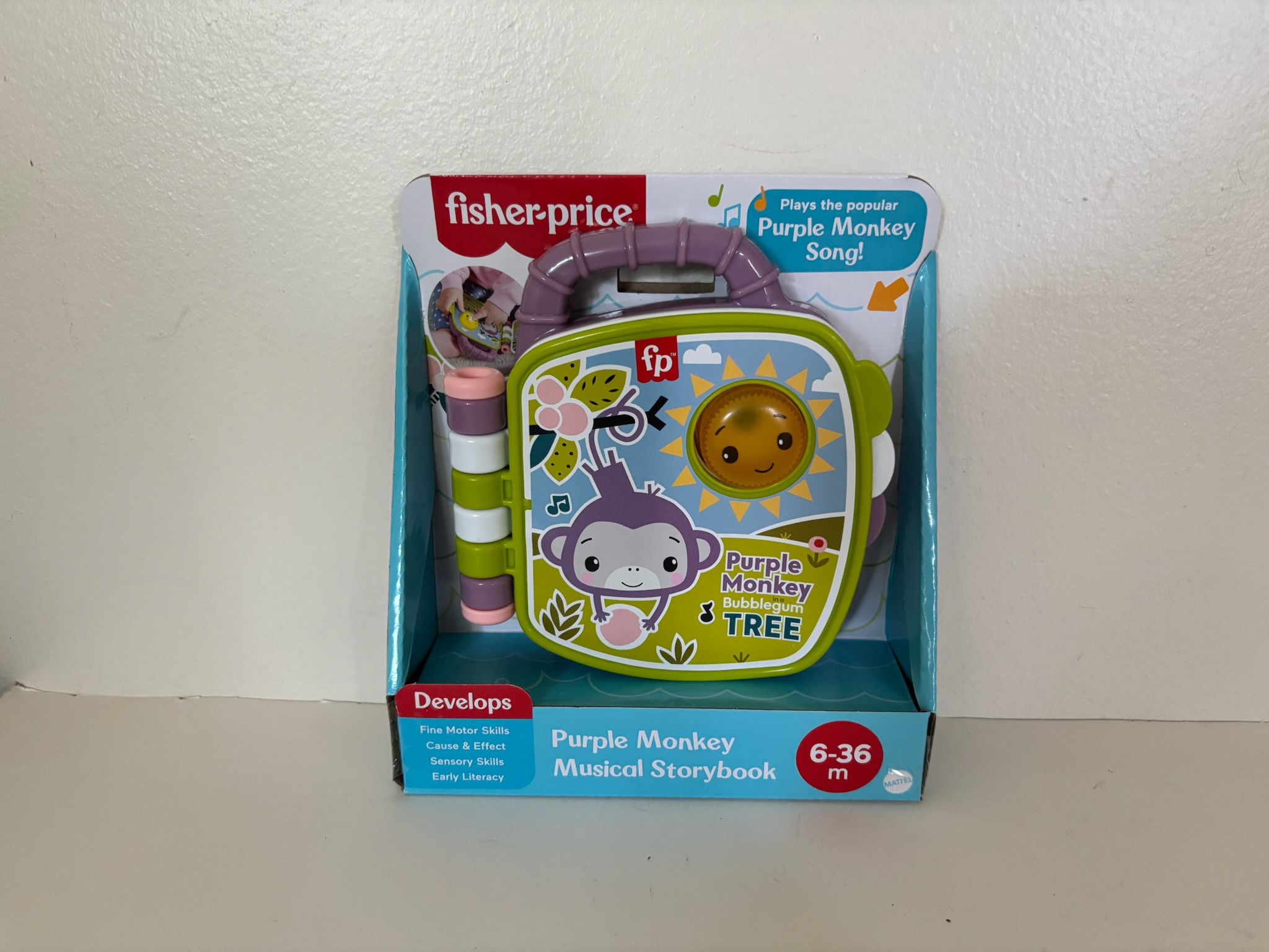 Fisher Price Purple Monkey Musical Storybook UPC #194735293414