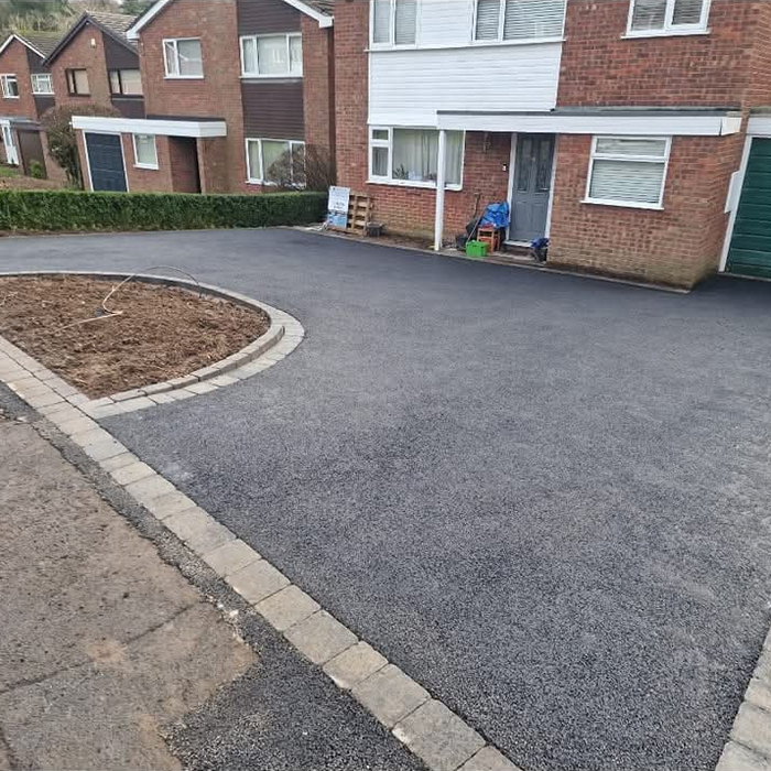 Dual tarmac driveways with central feature in Stafford