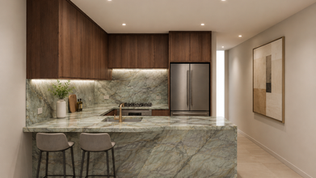 High-end German kitchen in West Village, NYC featuring walnut veneer cabinetry, Cristallo Tiffany quartzite countertops, mitered waterfall peninsula detailing, integrated appliances, and a compact U-shaped layout. Cabinetry investment ranged from approximately $45,000–$55,000, with total kitchen package costs of approximately $102,000–$117,000.