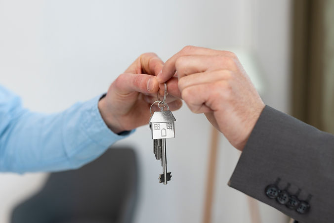 keys-being-held-by-real-estate-agent-buyer.jpg