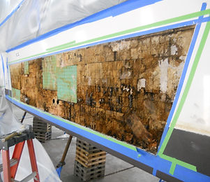 Cross section of a fiberglass repair job on a powerboat.