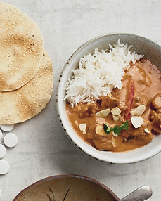 Butter chicken with rice and pappdam_edi