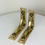 Thumbnail: brass shelf bracket