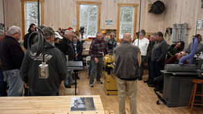 Group of senior citizens gathered at Pine Creek Woodworking School