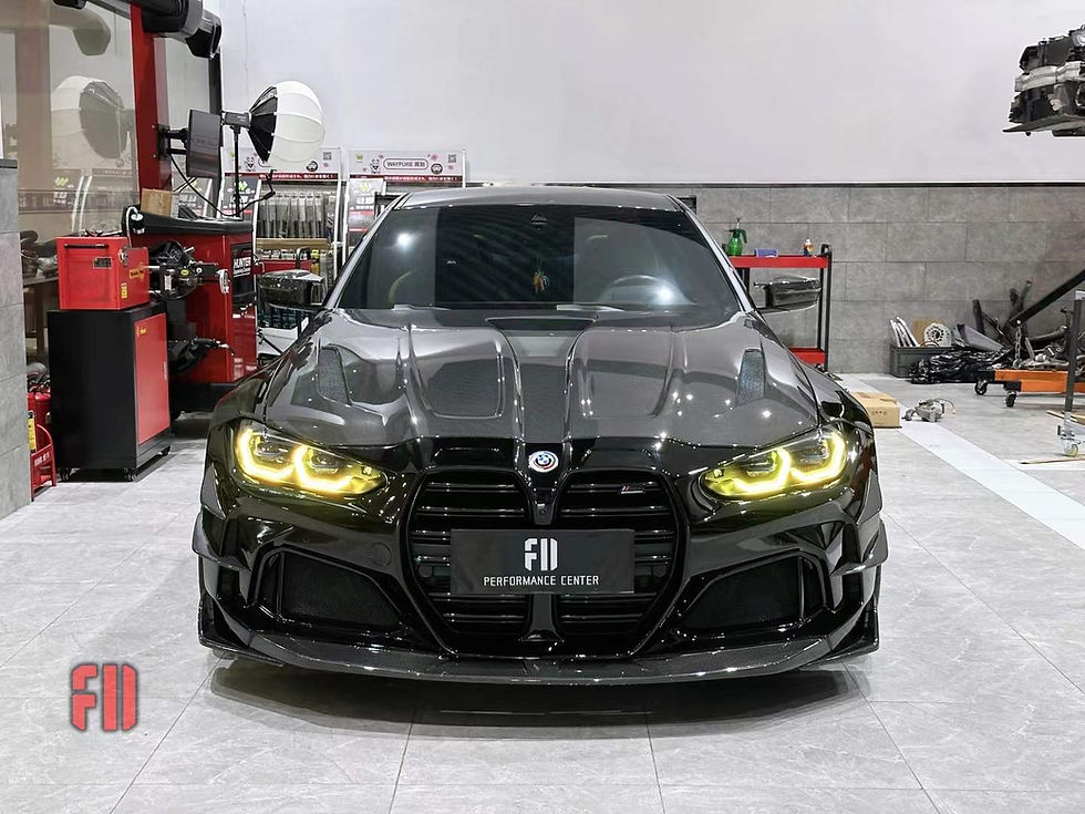 Thumbnail: Front view of a modified BMW G80 M3 equipped with Yellow DRL illumination inside a garage setting.