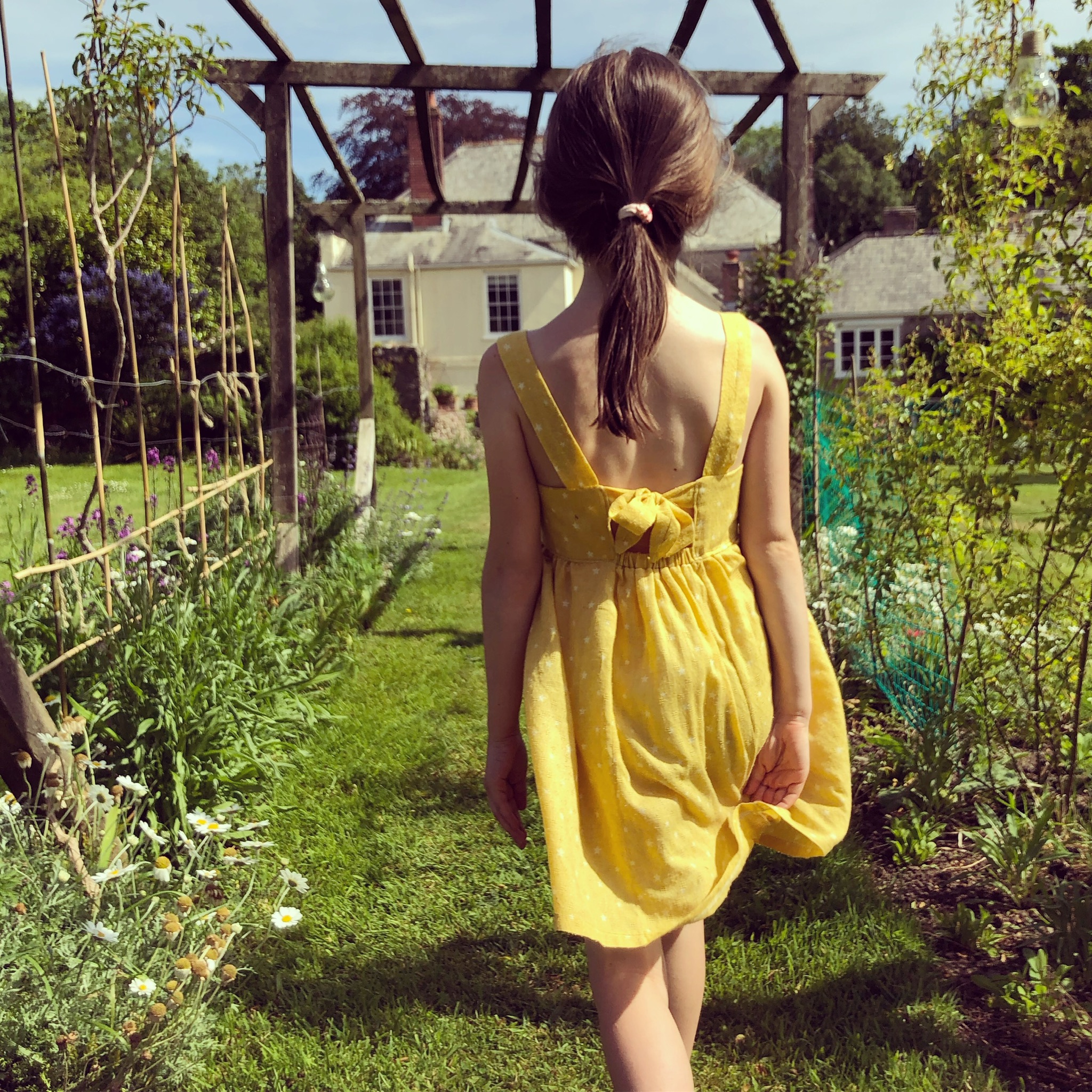 Bow back dress