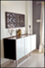 artistic elements like a Buddha statue, candelabra, wall art that add to the decor