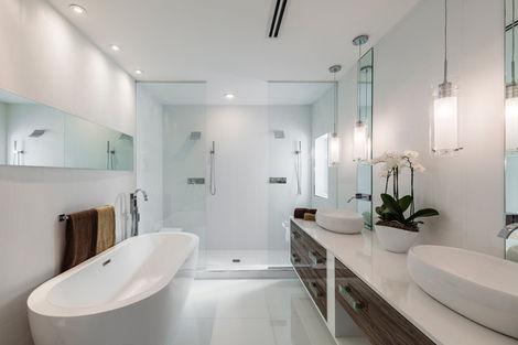 a bathroom with a bathtub and a sink
