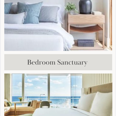 a bedroom sanctuary with a bed , nightstand , and large windows overlooking the ocean .