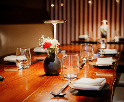 Dining table set with flowers in a restaurant