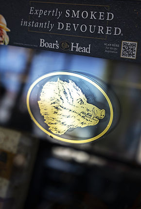 Boar's Head logo and text: Expertly smoked, instantly devoured, delicious deli meats.