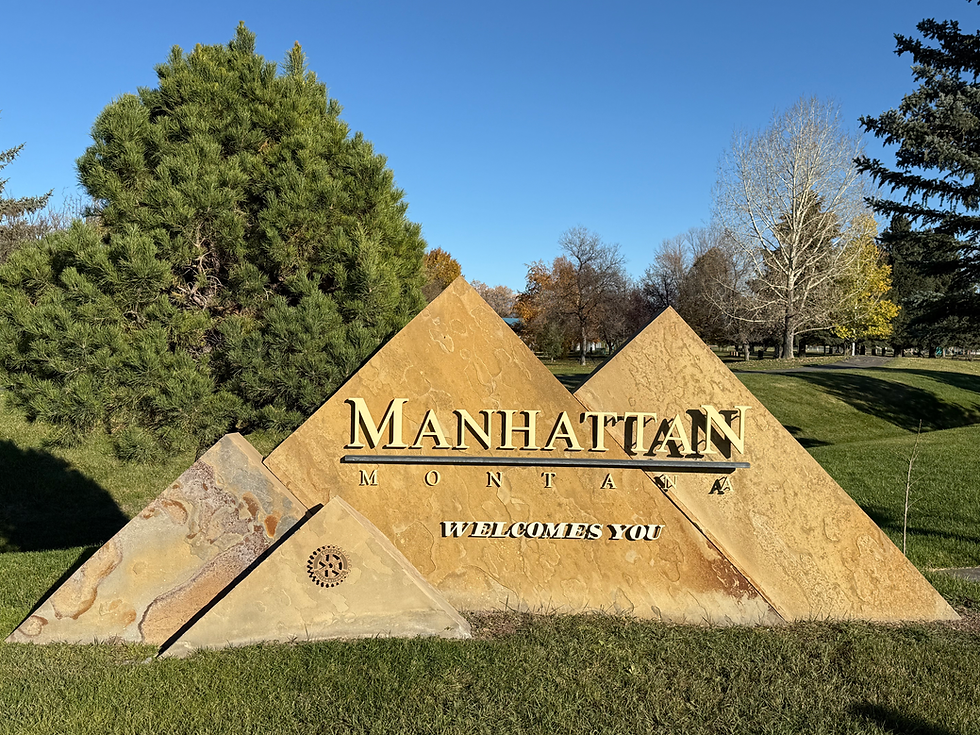 Manhattan, Montana welcomes you. This is the sign that greets you as you enter Manhattan, Montana. Tri Peaks Dental is just down the road from this location.