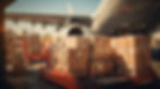 vecteezy_large-boxes-of-goods-are-loaded-onto-transport-planes_29632377.jpeg